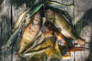 cold smoked fish on wooden background