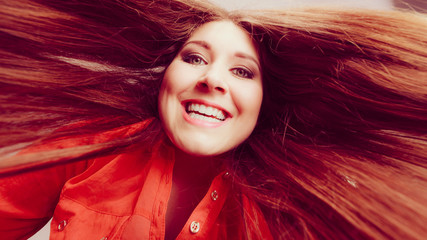 Wall Mural - Happy positive woman with long brown hair