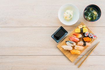 Wall Mural - Salmon tuna shell shrimp and other meat sushi maki