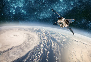 Wall Mural - space satellite monitoring from earth orbit weather from space, hurricane, typhoon on planet earth.
