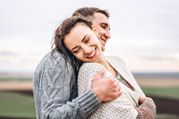 Wall Mural - Romantic happy couple enjoy spending time together outdoor.