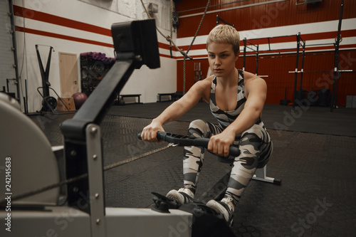 Trendy Looking Young Short Haired Blonde Female Athlete Doing Push