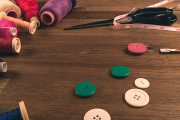 Sewing accessories placed randomly on a table