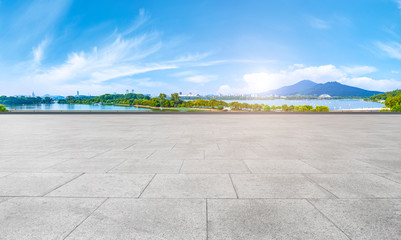 Wall Mural - Empty Plaza Floor Bricks and Beautiful Natural Landscape..