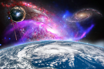 Wall Mural - sattelite in space above earh is orbiting the planet future technology b. elements of this image fur