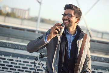 Wall Mural - Young business man going to work.