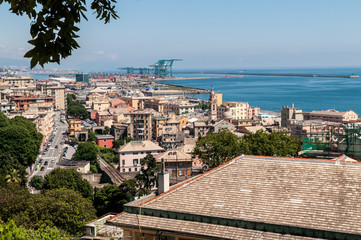 Genoa, Italy. Voltri District. Top view of the Voltri district from the Villa Duchessa di Galliera. In the background the container terminal of the port of Genoa