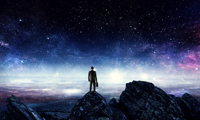 Wall Mural - businessman and cosmos concept