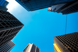 Fototapeta Paryż - Bottom up view of Hong Kong Commercial buildings