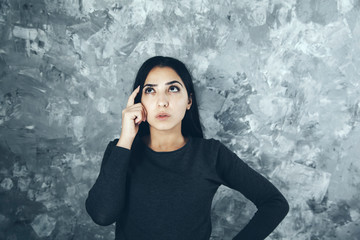 Wall Mural - thinking young woman