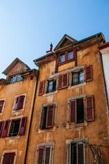 Wall Mural - Colourful rustic old buildings with red wooden windows, Vevey, Switzerland
