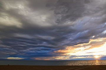 Wall Mural - Thunderclouds over the lake