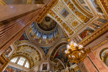 SAINT PETERSBURG, RUSSIA - January 2, 2019: Beautiful interior of the St Isaac's Cathedral. Luxurious ceiling and dome inside the famous cathedral.