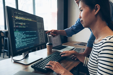 Wall Mural - programmer working in a software development and coding technologies. website design.technology conc