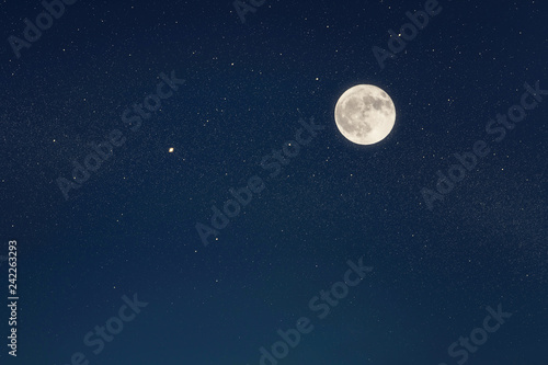 Fotografía Huge full moon on the night sky with bright stars