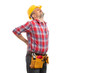 © Thunderstock - Builder stretching  painful back .