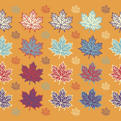 Wall Mural - Maple leaves on orange background