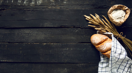 Wall Mural - Still life with bread, flour and spikelets