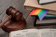 © yuriygolub - Judge's gavel, book and rainbow