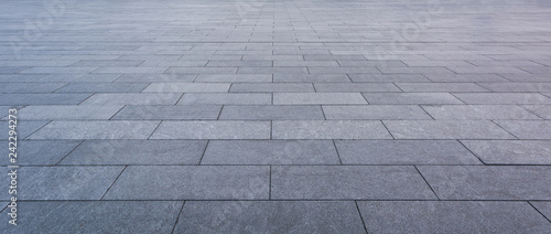 Cuadros en Lienzo Grey brick stone street road. Light sidewalk, pavement texture