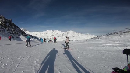 Poster - Skiing in high mountains. Wide ski slopes. Winter sports. Snow and sun in the mountains.