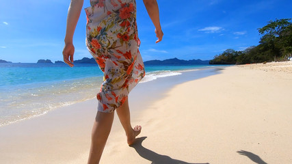 woman walking on the beach, El Nido Philippines