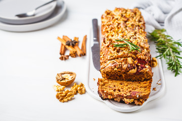 Wall Mural - Vegan berries and nuts bread. Plant based dessert on white background. Healthy vegan food concept.