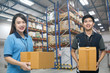 © 9kwan - Two workers carrying box in the warehouse (ฺBlur background) , Asian delivery men carrying boxes in the distribution warehouse (ฺBlur background)
