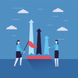 © Gstudio - business women with flag and chart arrows
