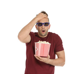 Wall Mural - Emotional man with 3D glasses and popcorn during cinema show on white background