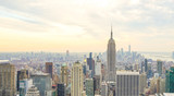 Fototapeta Nowy Jork - Empire State Building and skyscrapers at Manhattan skyline in New York City.