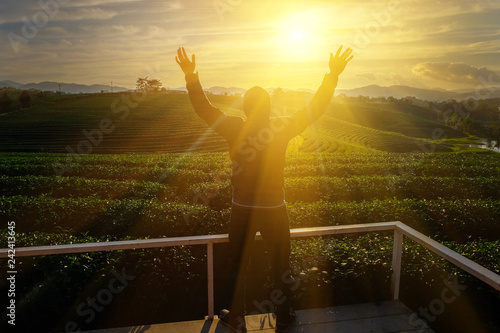 Men raise arms to thank God.