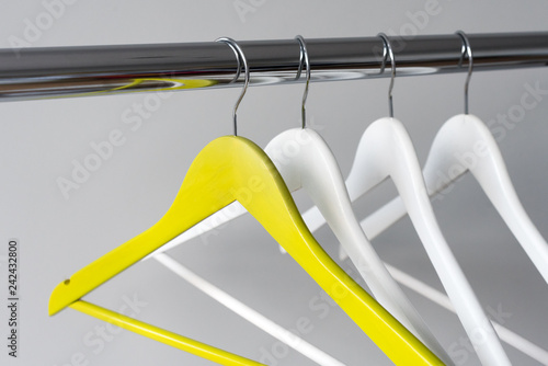 grey wooden coat hangers