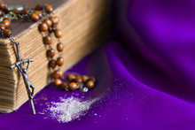 Ash Wednesday Religion Concept On Violet Fabric Background With Rosary

