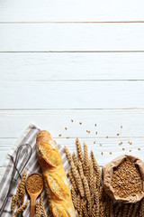 Wall Mural - Still life with bread, flour and spikelets