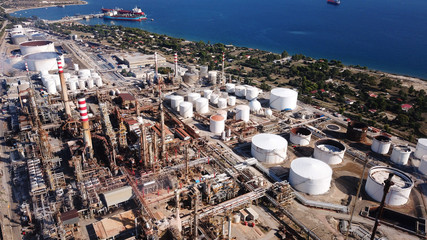 Wall Mural - Aerial drone photo of working industrial oil refinery and power plant