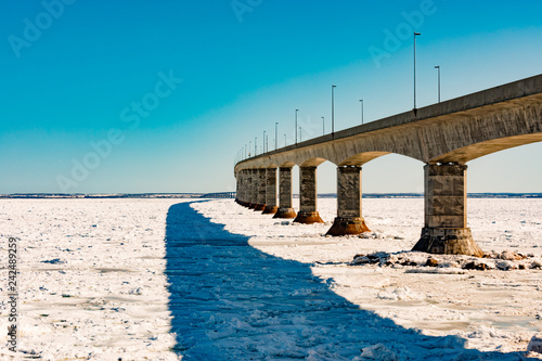 Fotografie, Tablou Confederation Bridge over sea ice to PEI Canada