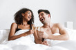 © Drobot Dean - Beautiful happy young multiethnic couple relaxing