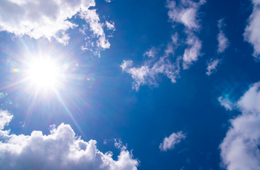 Wall Mural - cloud scape and sunshine with blue sky background