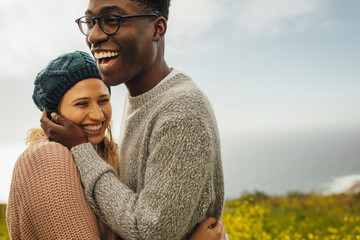 Wall Mural - loving interracial couple spending time together