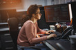 © BalanceFormCreative - Female programmer working on new project.She working late at night in her office.
