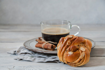 Sticker - Breakfast: cinnamon buns with a cup of coffee.