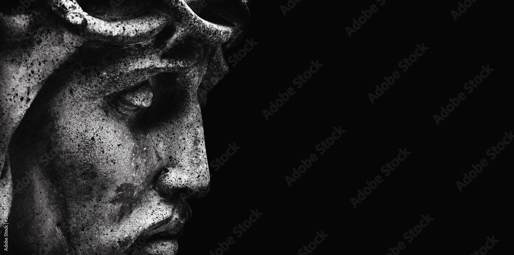 Jesus Christ in profile. An ancient statue. Religion, faith, death, suffering, immortality, God concept. - obrazy, fototapety, plakaty 