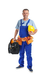 Poster - Electrician with tools and safety helmet wearing uniform on white background