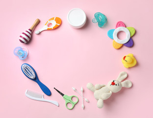 Wall Mural - flat lay composition with baby accessories and toys on color background. space for text
