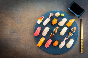 Wall Mural - Nigiri sushi set with salmon tuna shrimp prawn eel shell and other sashimi