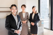 © taka - asian businesswomen working in office