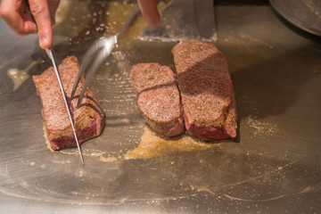 Wall Mural - Japanese chef cooking grilled wagyu kobe beef steak