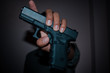 © taisuke - A man holding  gun in hand, the ship ready to shoot.A man is killer.