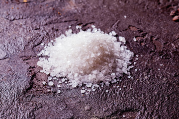 Sea salt heap close up on the table